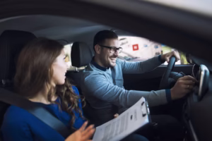 Driving instructor conducting a lesson with a learner driver in a car, representing high-demand careers in the UK and training offered by I Passing Smiles